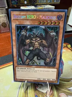 Yugioh! Destiny HERO - Malicious RA03-EN001 Secret Rare 1st Edition NM/M - Image 1