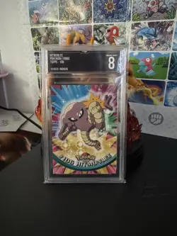 TOPPS NEAR MINT 8 - Hitmonlee 106 - Pokemon 1998 - Image 1