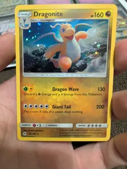 Pokemon Card Dragonite Cosmos Holo Sun & Moon Base Set 96/149 Holo Rare - Image 1