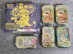Pokemon Surging Sparks ETB Box & Prismatic Evolution Tin Lot Scarlet & Violet - Image 1