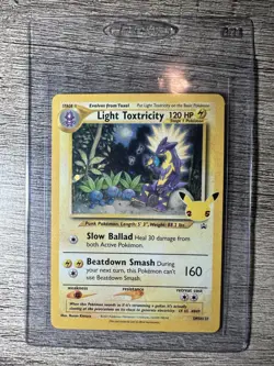 Light Toxtricity SWSH137 SWSH: Sword & Shield Promo Cards Holo - Image 1
