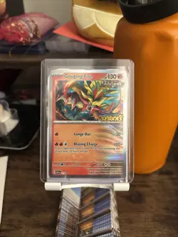 Pokemon TCG Gouging Fire SVP151 NM Stamped Promo Surging Sparks - Image 1