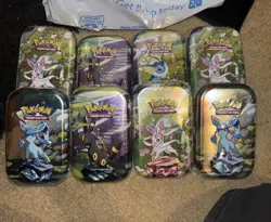 Pokemon Prismatic Evolutions Complete Set of 8 Mini Tins SEALED - Image 1