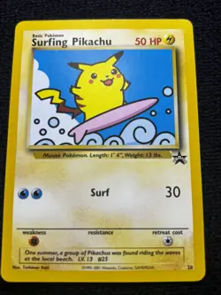 2001 Pokemon Surfing Pikachu Non-Holo WOTC Black Star Promo #28 - Pokemon League - Image 1