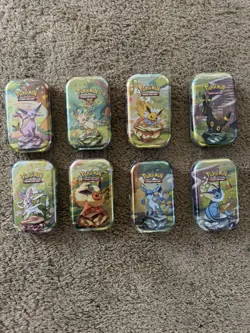 Pokemon Prismatic Evolutions Complete Set of 8 Mini Tins SEALED - Image 1