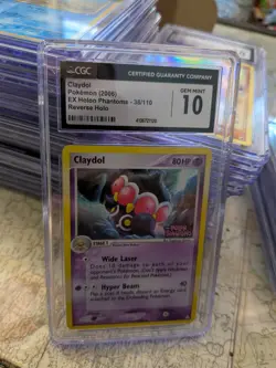 (TOP POP 11) CGC 10 GEM MINT Claydol Reverse Holo 38/110 Holon Phantoms Pokemon - Image 1