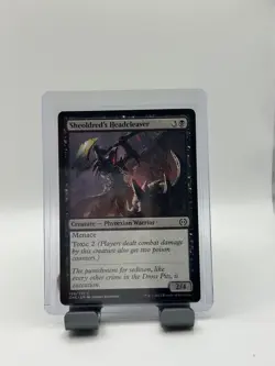 MTG, Sheoldred's Headcleaver $3 ORDER MIN Phyrexia: All Will Be One Regular - Image 1