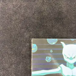 1999 Topps Pokemon the First Movie Stealing Pokemon Silver Foil #27 Blue Logo - Image 3