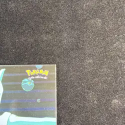 1999 Topps Pokemon the First Movie Stealing Pokemon Silver Foil #27 Blue Logo - Image 4