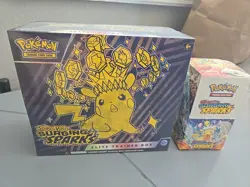 Pokemon TCG Surging Sparks Booster Box (18 Pack) and Elite Trainer Box Bundle - Image 1