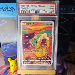 Psyduck 286/SM-P Munch - PSA 9 - Japanese Pokemon Promo Card Tomokazu Komiya - Image 1