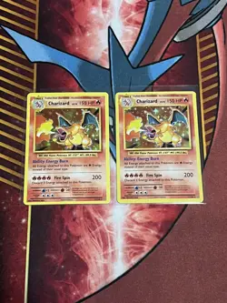 2x Pokemon Charizard XY Evolutions 11/108 Holo barely played - Image 1