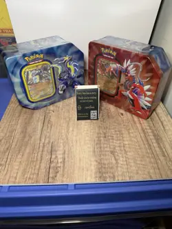 Pokemon TCG Paldea Legend Tins Koraidon Miraidon Set of 2 FACTORY SEALED!! - Image 1