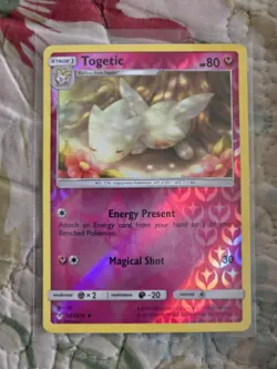 Pokemon TCG Togetic 137/214 Unbroken Bonds Reverse Holo Uncommon NM - Image 1