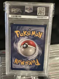 1999 POKEMON FOSSIL 1ST ED #7 HITMONLEE-HOLO PSA 7 - Image 2