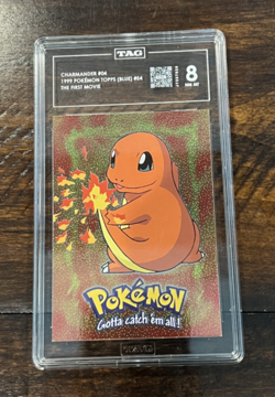 Charmander #4 - 1999 Pokemon Topps (BLUE) #E4 First Series/Movie - TAG 8 - Image 1