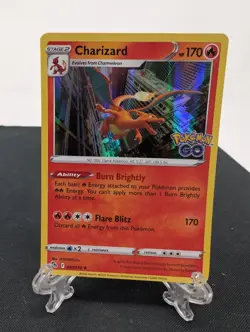Charizard 10/78 Holo Rare NM Pokemon TCG - Pokemon Go English - Image 1