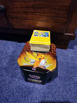 Pokemon TCG Hidden Fates Raichu Tin Only (Empty) with 100~ Random Bulk - Image 1