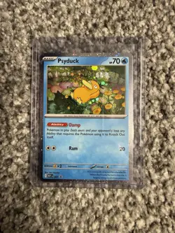 Psyduck (Cosmos Holo) Mega Evolution Promo SVP 007 Pokemon Card NM - Image 1