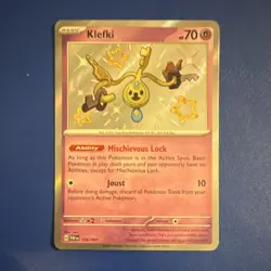Pokemon Klefki 159/091 SV: Paldean Fates Shiny Rare Basic HP70 Holo Joust Card - Image 1