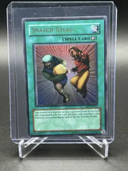 Yugioh Snatch Steal DB1-EN021 Unlimited Edition Ultra Rare NM/LP - Image 1