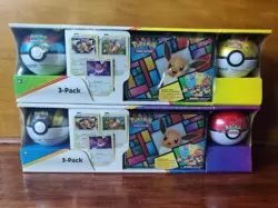 2 SETS Pokemon Eevee Evolutions 3-Pack Treasure Chest Tin & 2 PokeBalls - Costco 820650101373 - Image 1
