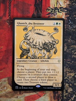 MTG Card: Gluntch, the Bestower (CL: Battle for Baldur's Gate) SHOWCASE - Image 1
