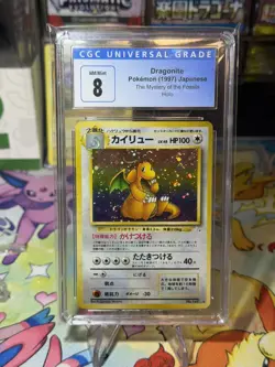 1997 POKEMON JAPANESE FOSSIL #149 DRAGONITE-HOLO CGC 8 - Image 1