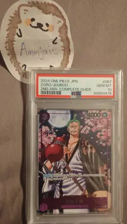 PSA 10 Zoro-Juurou OP05-067 Promo 2nd ANNIVERSARY COMPLETE GUIDE ONE PIECE JPN - Image 2