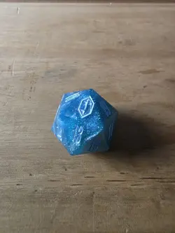 Magic: The Gathering Final Fantasy Gift Bundle "Crystal" Shinra Blue D20 die. - Image 1