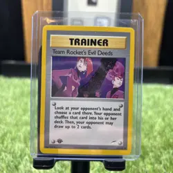 Team Rocket’s Evil Deeds 103/105 1st Edition Trainer Pokemon Card NM - Image 1