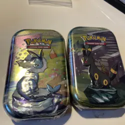 X2 Pokemon—Prismatic Evolutions Mini Tin – Vaporeon Umbreon new sealed - Image 1