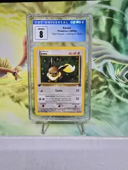 2000 Pokemon Team Rocket 1st Edition #55 Eevee CGC 8 NM mint+ TCG - Image 1