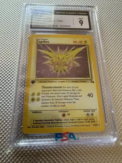 1999 Pokemon TCG Fossil Zapdos Holo 1st Edition CGC 9 15/62 Card Stock - Image 1