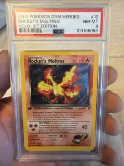 Pokemon TCG 1st Edition Rockets Moltres Holo Rare Card 12/132 Gym Heroes PSA 8 - Image 1