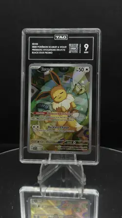 Pokemon Prismatic Evolutions -SVP Eevee 173 Black Star Promo Graded TAG 9 - Image 1