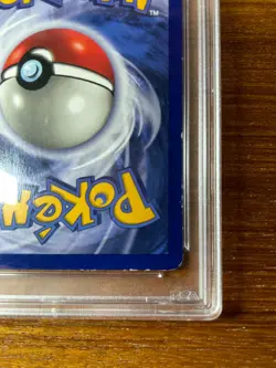 1999 Pokemon Fossil Dragonite 4/62 Holo First Edition PSA 5 - Image 4
