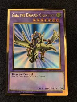 Yu-Gi-Oh! Gaia the Dragon Champion (MAGO-EN025) Maximum Gold 1st Ed NM - Image 1