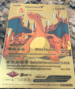 gold foil Charizard V Pokemon trading card - Image 1