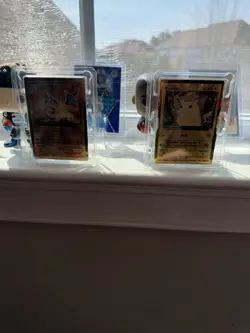 2021 Pokemon 25th Anv. Celebrations Gold Metal Pikachu & Charizard - Image 1