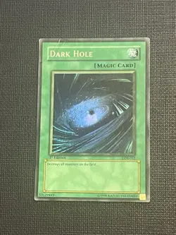 Dark Hole 1st Edition LOB-052 Wavy Foil Super Rare Yu-Gi-Oh Card DMG - Image 1