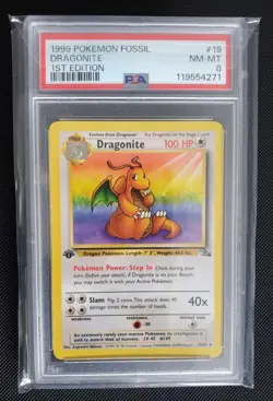 1999 POKEMON FOSSIL 1ST EDITION #19 DRAGONITE PSA 8 - Image 1