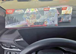 Pokemon Prismatic Evolutions Surprise Box Booster Bundle Eevee Nintendo TCG - Image 1