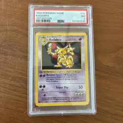 1999 POKEMON GAME 1ST ED #32 KADABRA PSA 7 - Image 1