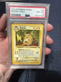 PSA 8 Raichu Pokemon Fossil Holo Unlimited 14/62 1999 Wizards of the Coast Card - Image 1