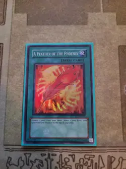 YUGIOH A FEATHER OF THE PHOENIX FET-EN037 SUPER UNLIMITED ED LP - Image 1