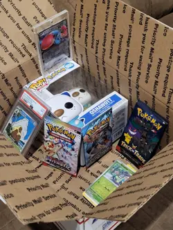 Pokemon Mystery Box - GRADED CARD + SEALED POKEMON PACKS + POKEMON ITEM - Image 1
