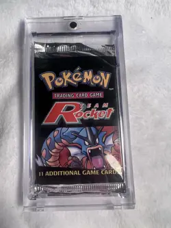 Pokemon TCG Team Rocket Unlimited Booster Pack Sealed English w/ Magnetic Case - Image 1