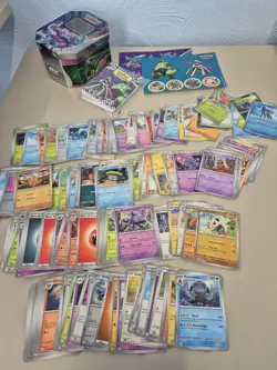 Pokemon TCG Bulk Bundle 200 Random Cards Job Lot + Tin Stickers + Mini Folder #1 - Image 1