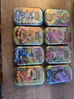 Pokemon TCG Prismatic Evolutions Mini Tin Complete Set - 8 Factory Sealed Tins - Image 1